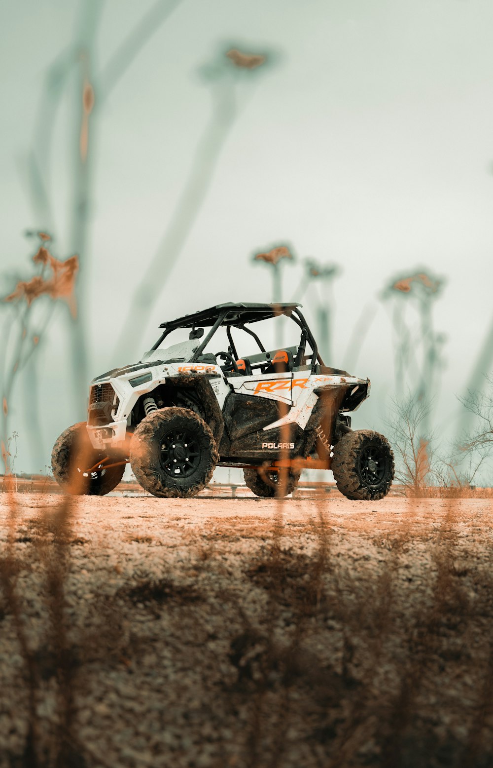 a toy car on a dirt road