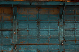 a blue door with a metal frame