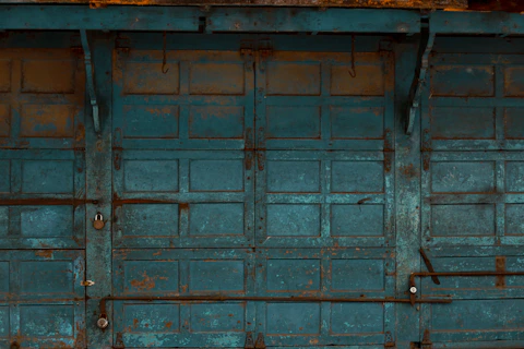 a blue door with a metal frame