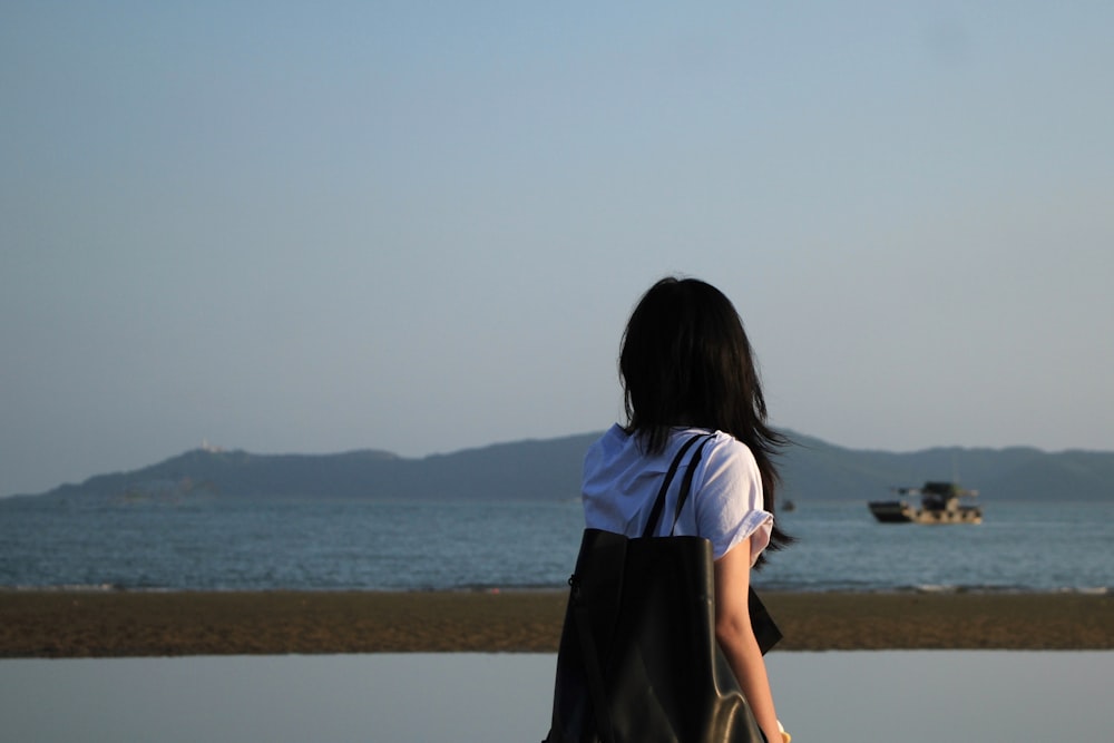 a person standing on a beach