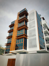 Modern modular office building with large windows and wooden panels.