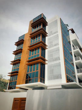 Modern modular office building with large windows and wooden panels.