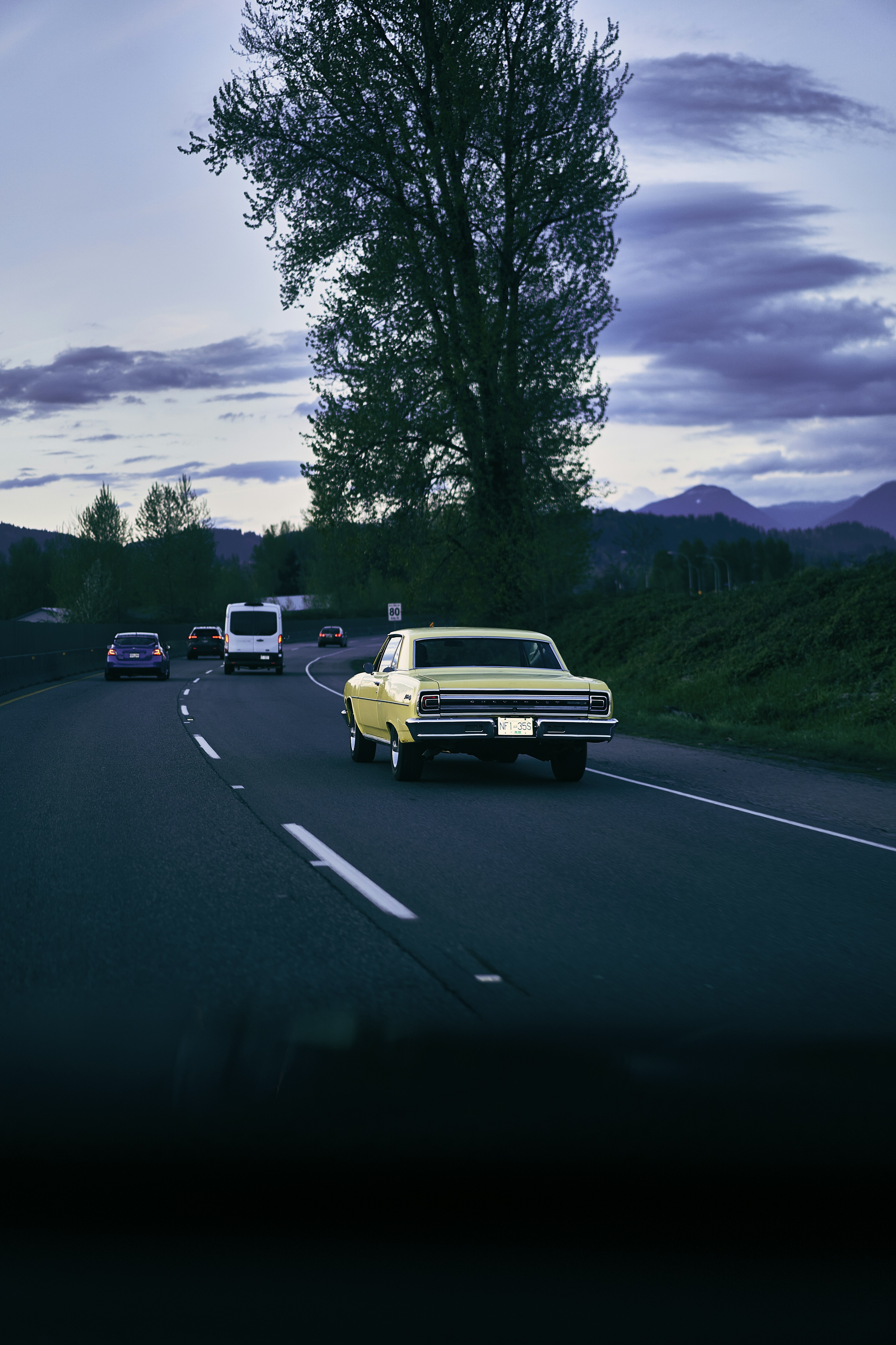 a group of cars on a road