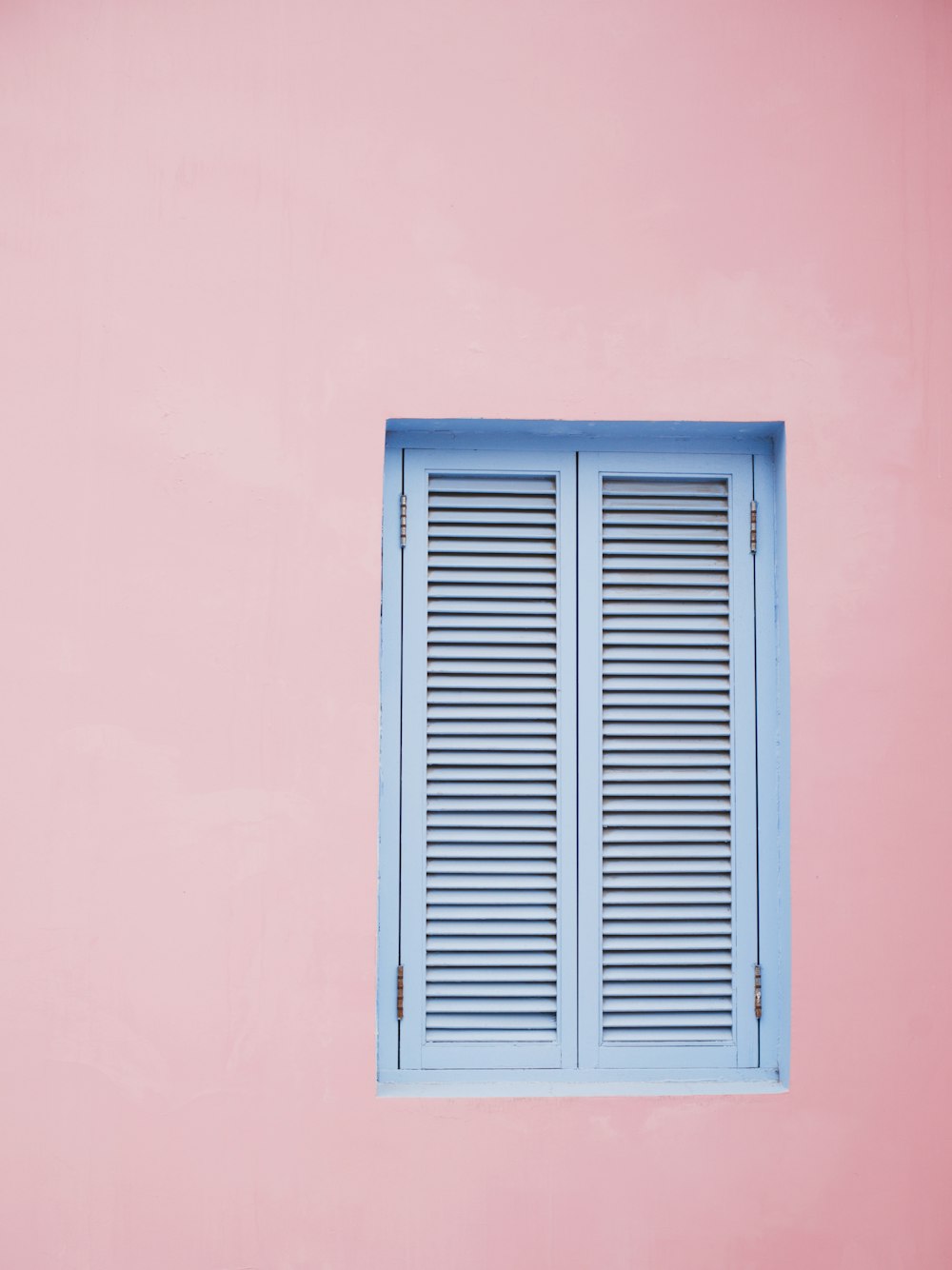 a window with a blue and white frame