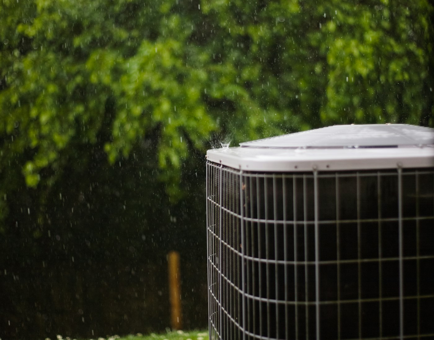 Residential air conditioning condenser unit outdoors
