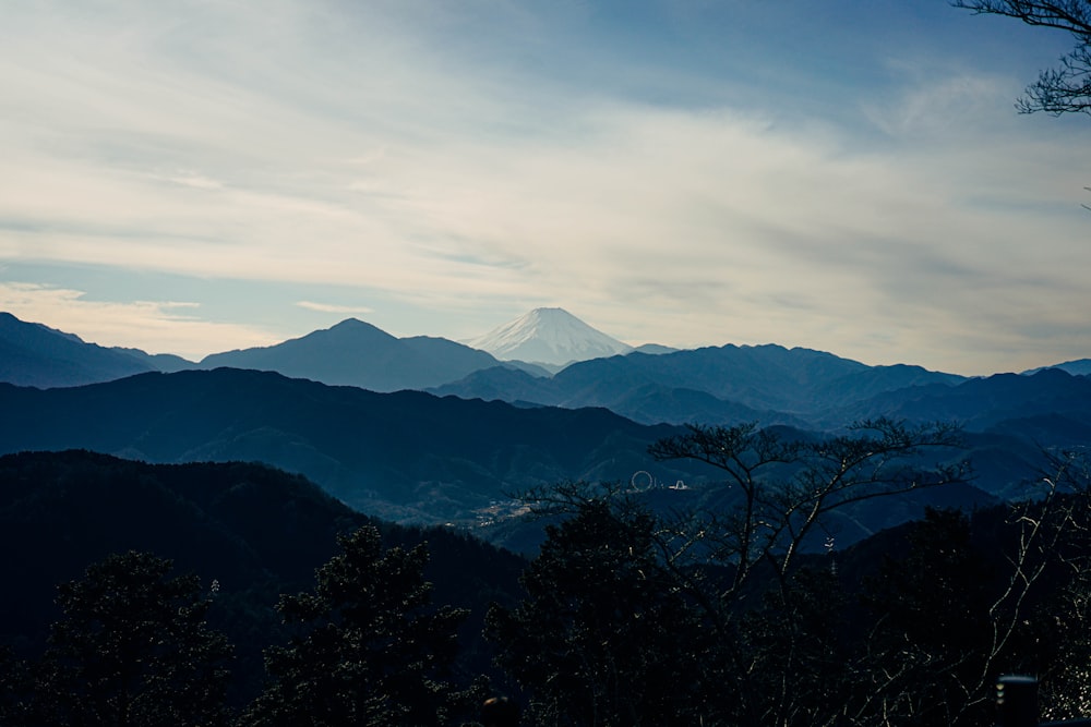 a snowy mountain in the distance