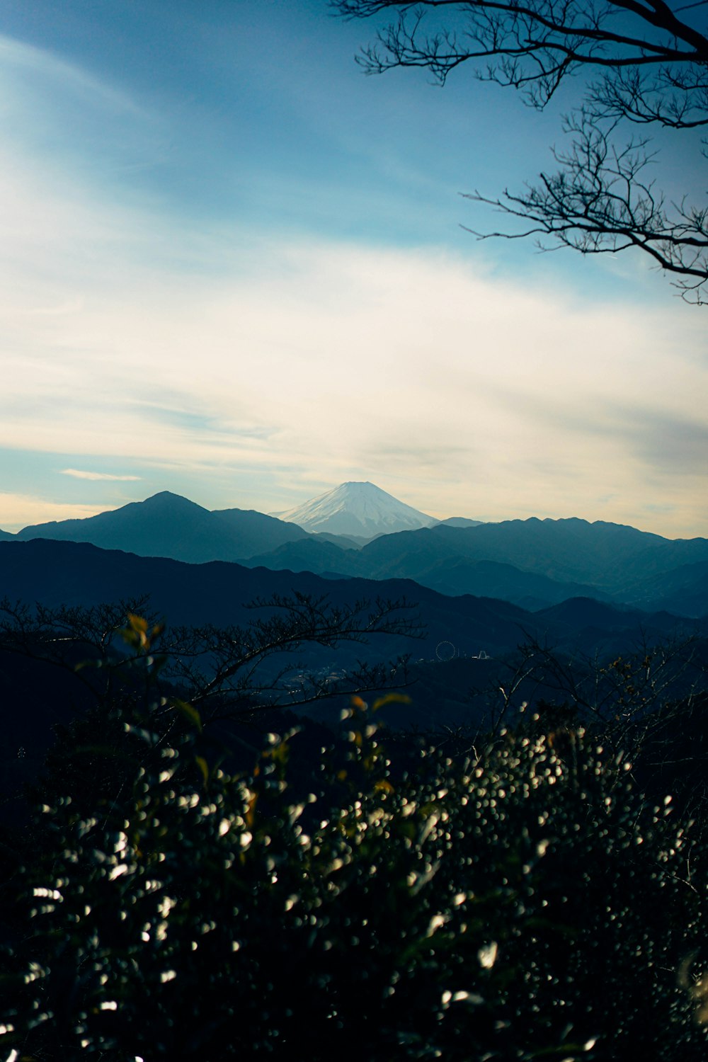 a mountain with a snow capped peak