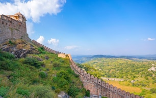 a stone wall on a hill