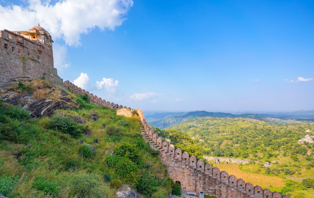 a stone wall on a hill