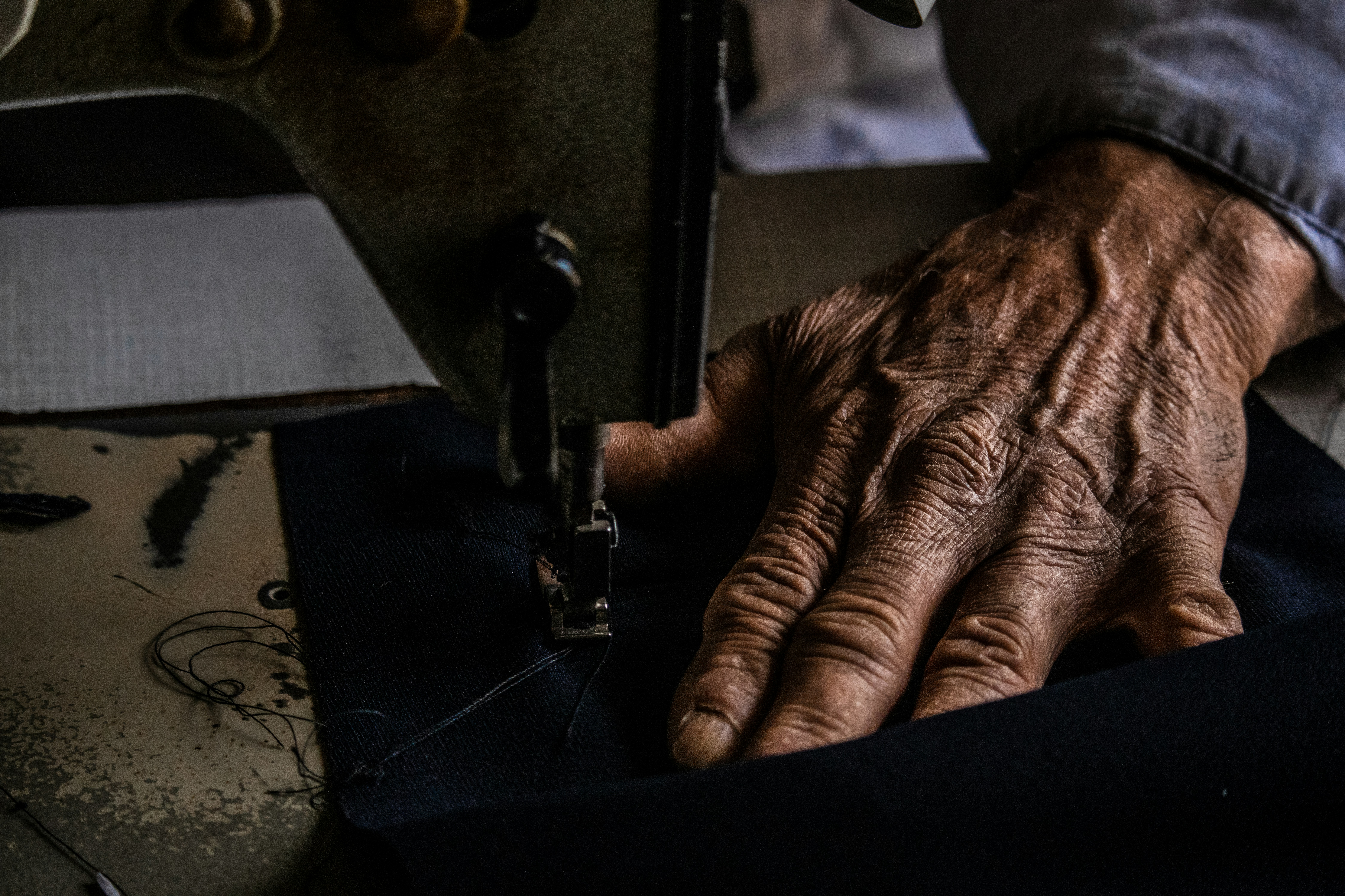 a person's hand holding a key