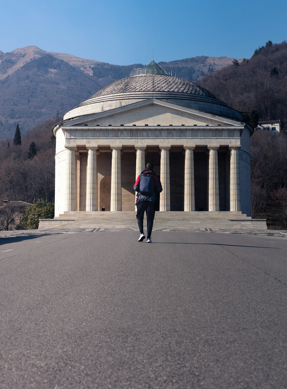 a person walking outside of a building