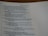A close-up view of a page from a book, displaying text from Psalm 46:9. The text includes verses with references to topics like beauty, gifts, joy, and the palace of the king. The page has a cream-colored background with black printed text.