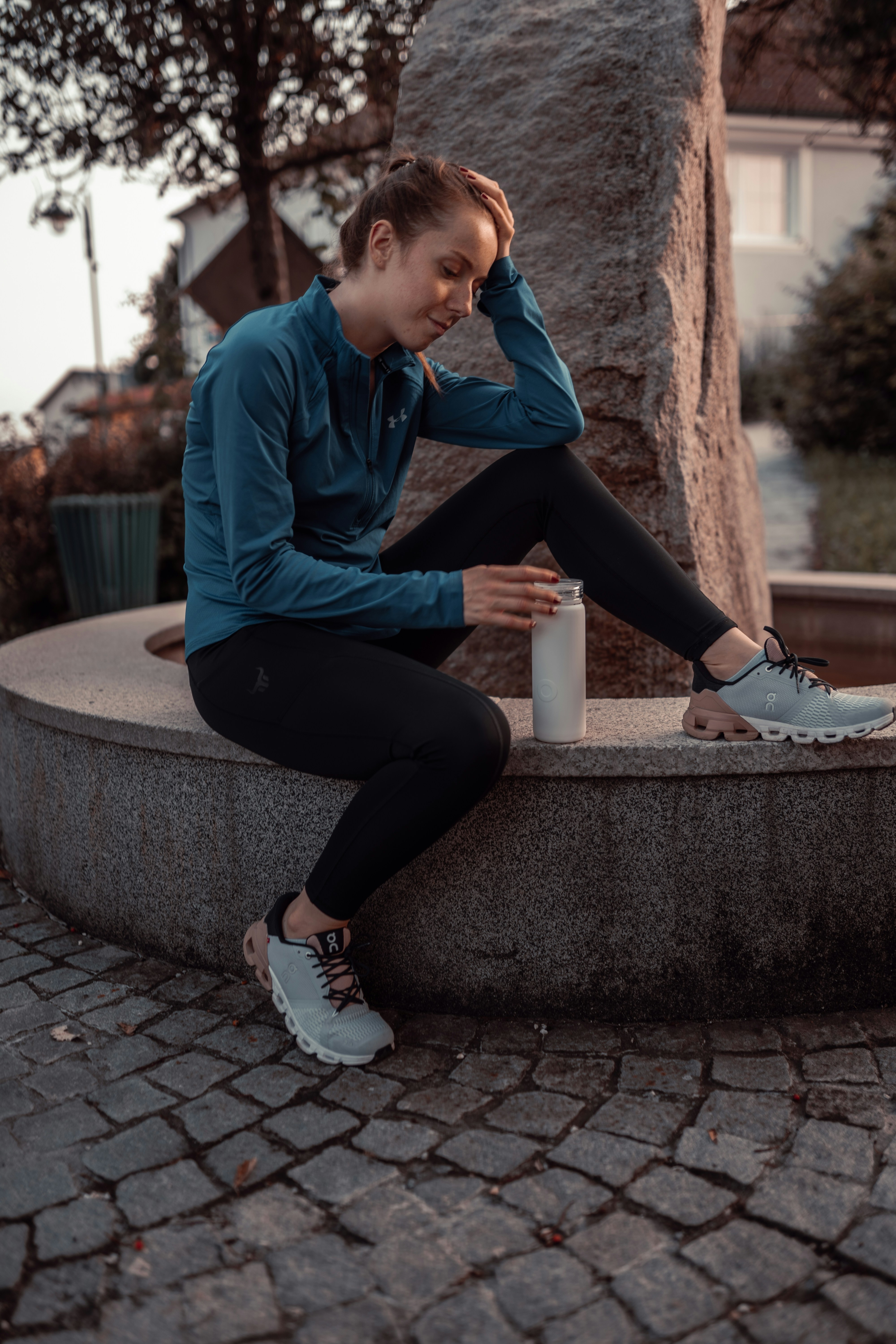 a man sitting on a ledge