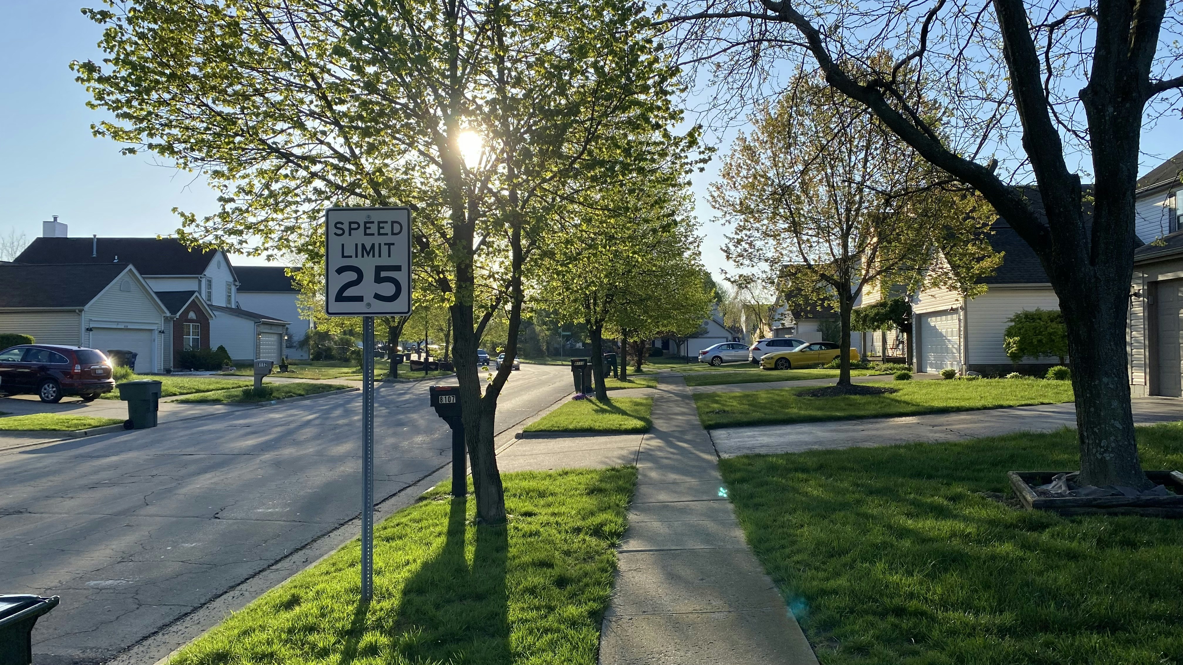 A sign on the sidewalk.