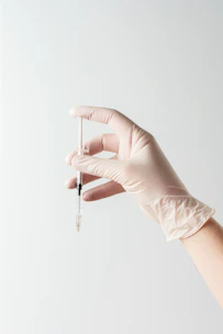 a hand holding an umbrella