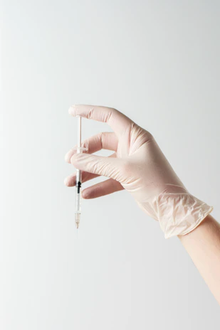 a hand holding an umbrella