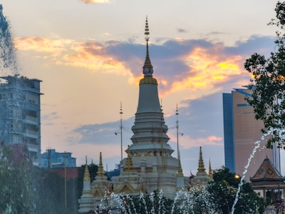 Front view of Shrimad Rajchandra Mandir with intricate architecture at sunset.