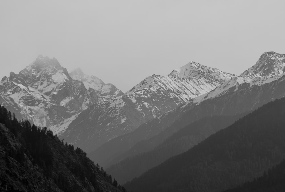 a mountain range covered in snow