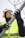 a person wearing a helmet and goggles holding a pole