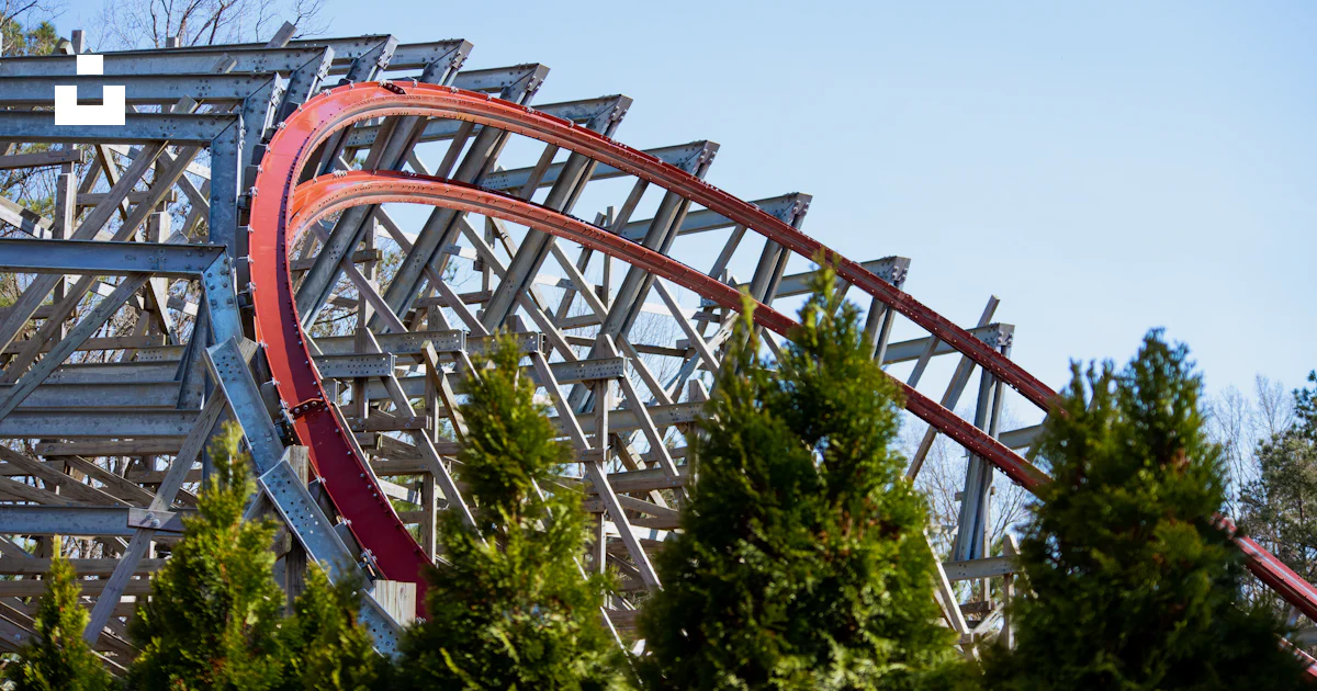 A roller coaster with trees around it photo – Free Kings dominion Image ...