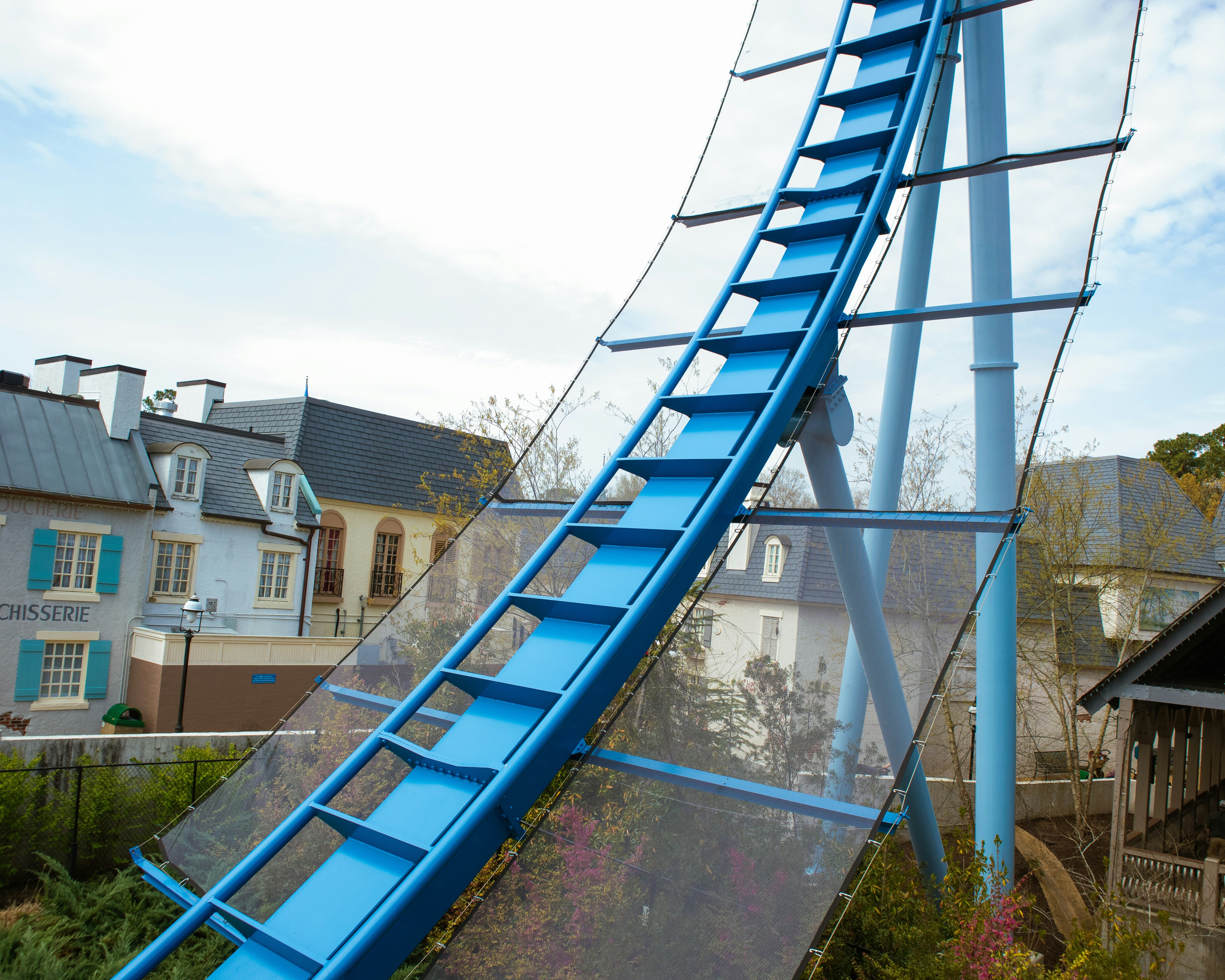 a blue ladder on a house