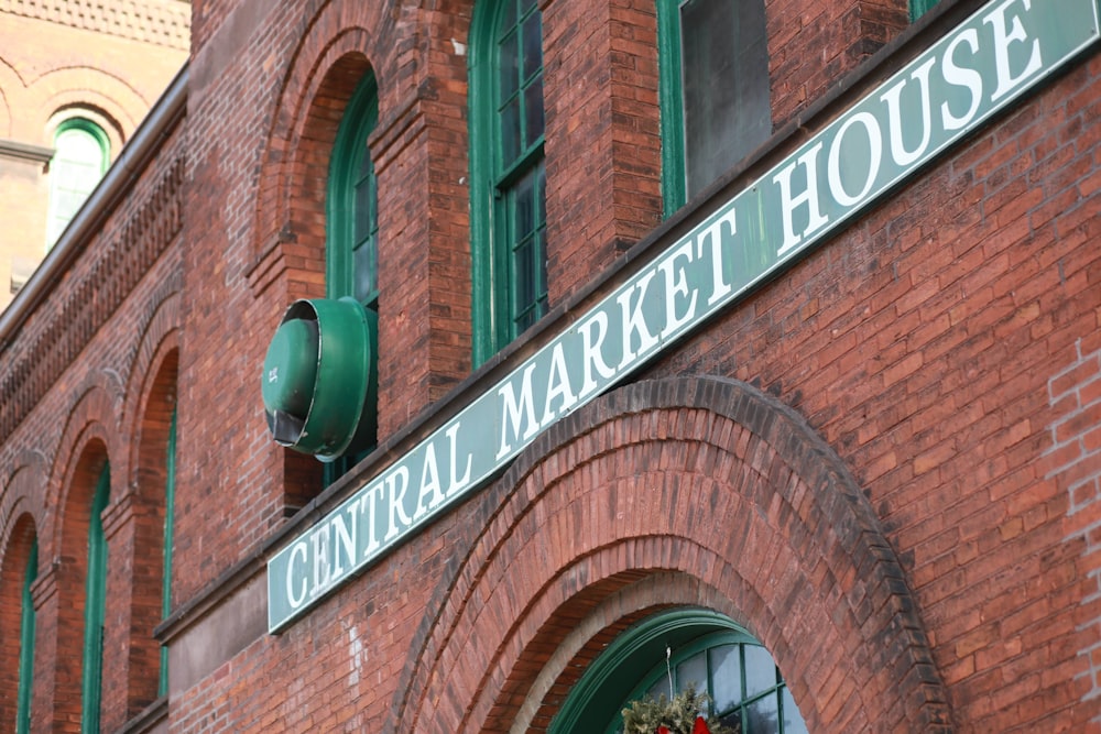 a street sign on a brick building