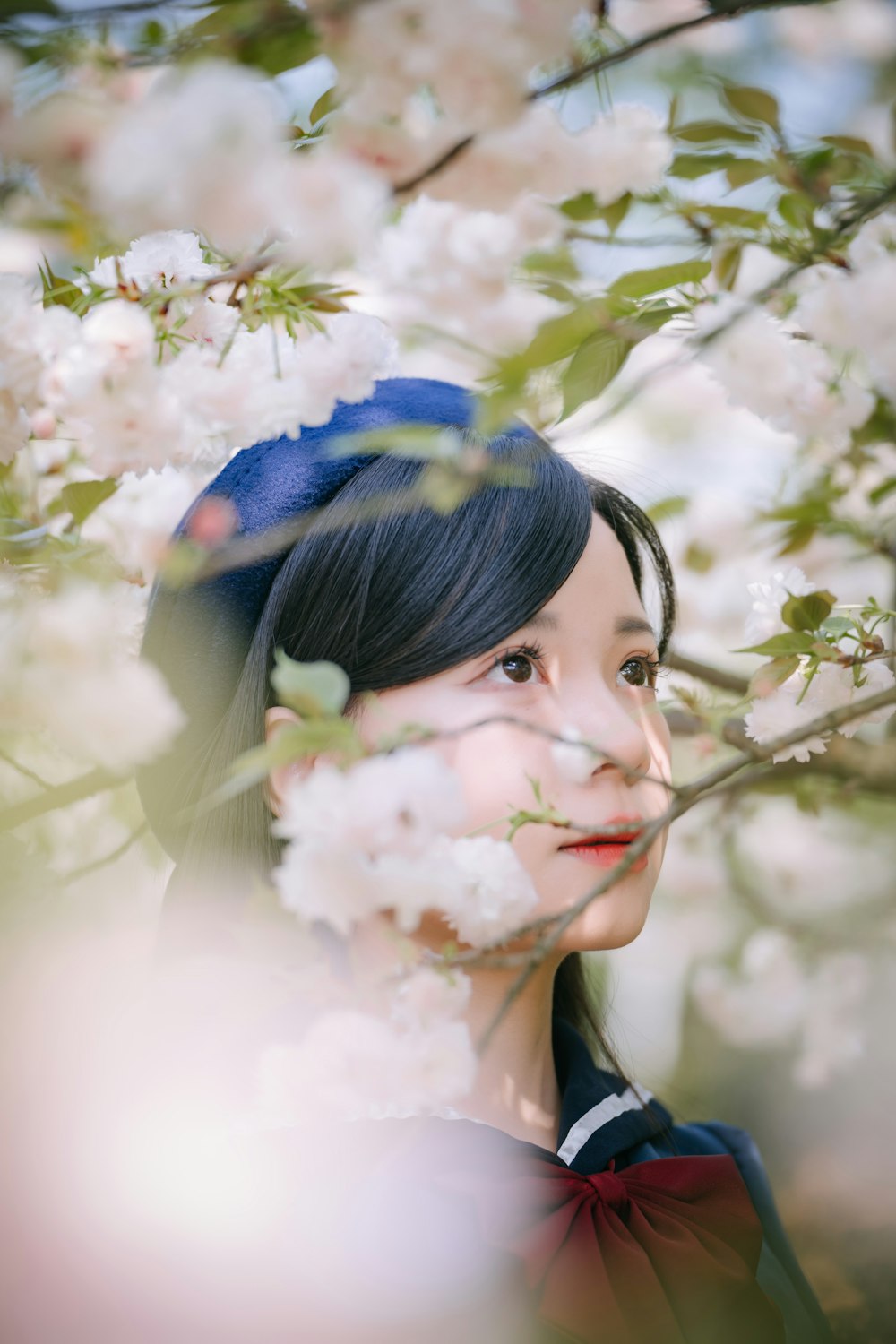 a person with a flower in the hair