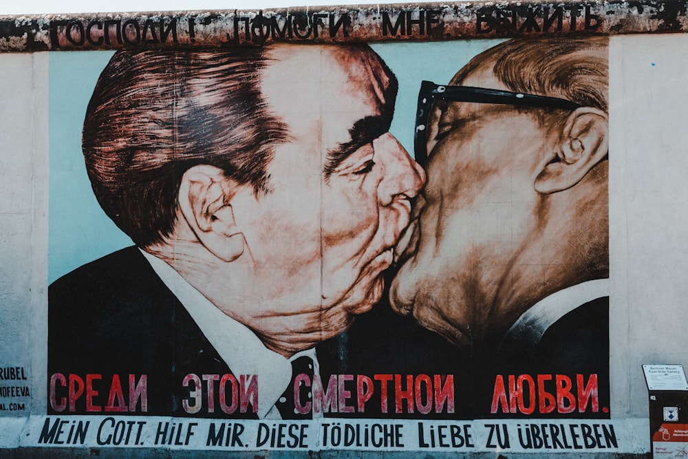 a poster of two men