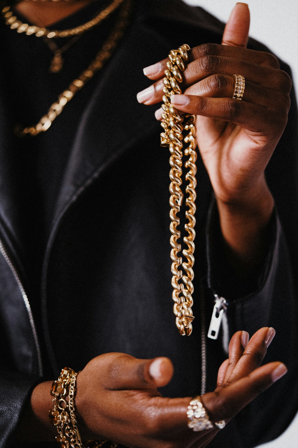 a person holding a chain