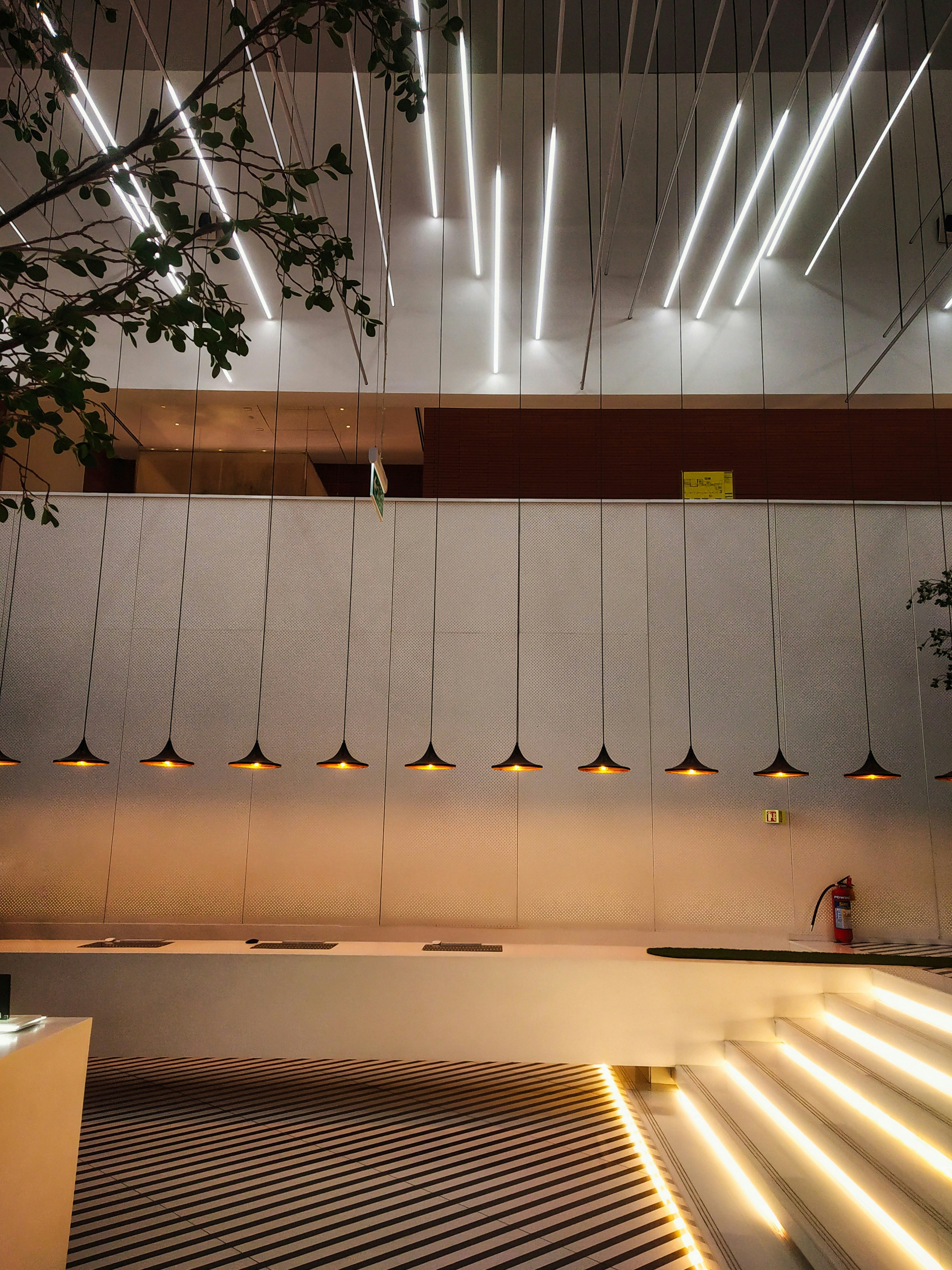 Pendant lighting and ceiling lights in a dining area