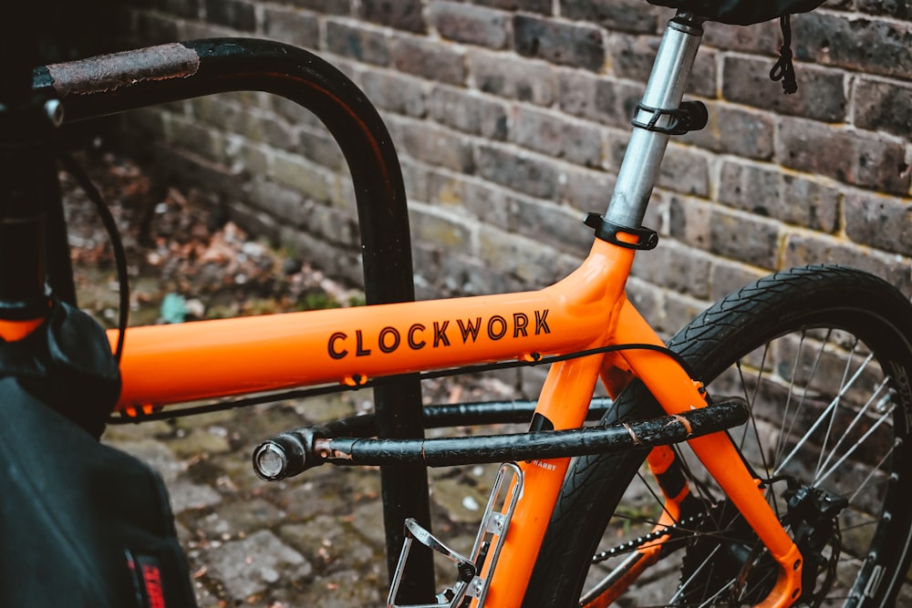 a bicycle parked on a sidewalk