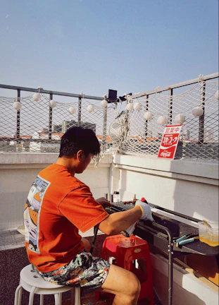 Young professionals enjoying a lively barbecue on the terrace of the Guadeloupe house.
