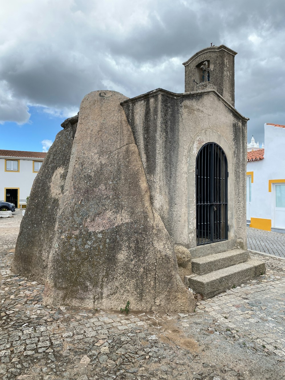 a stone building with a tower