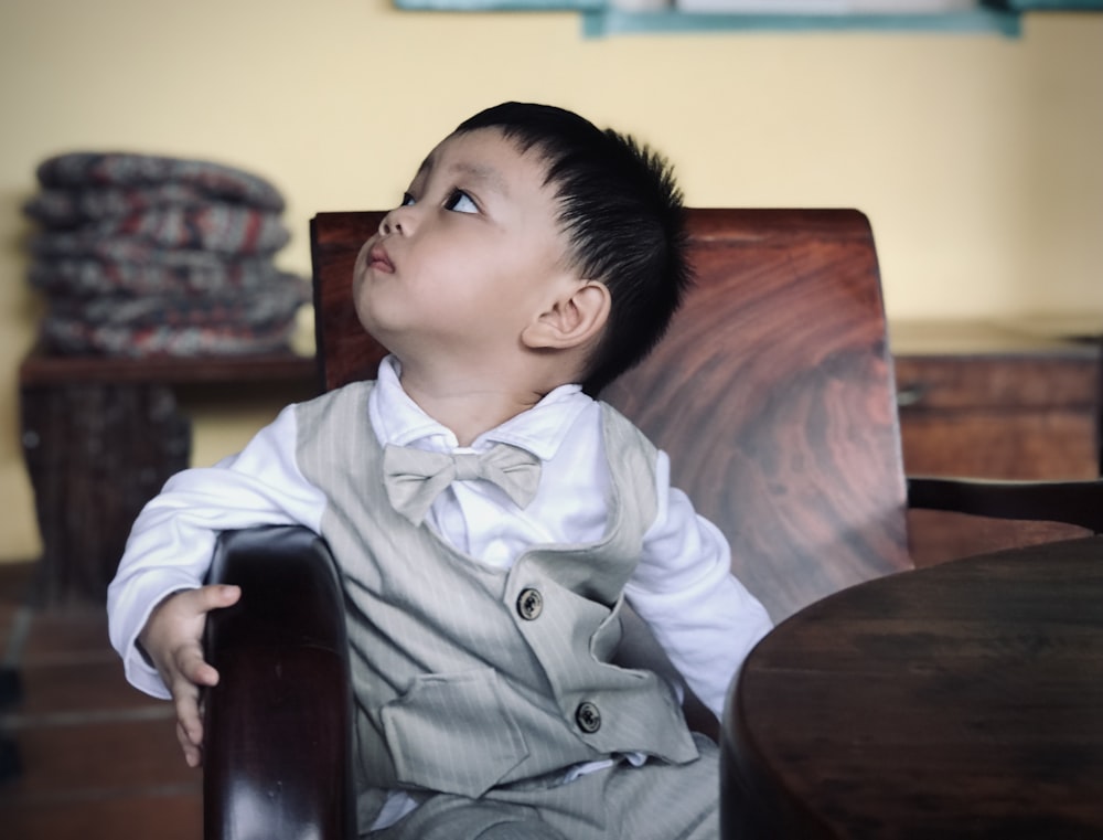 a child sitting at a table