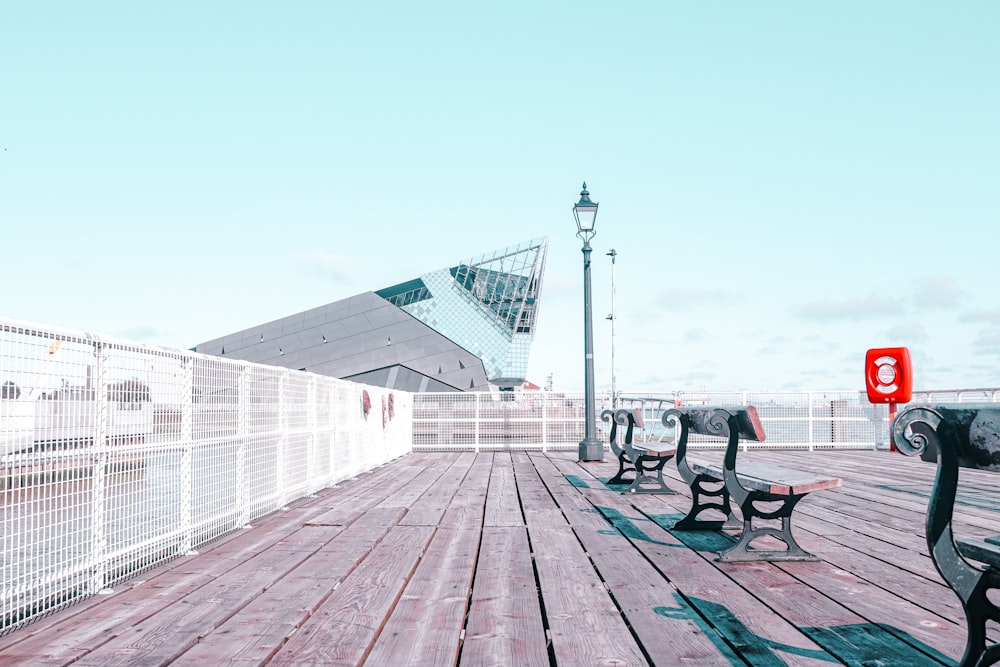 a group of benches sit unoccupied