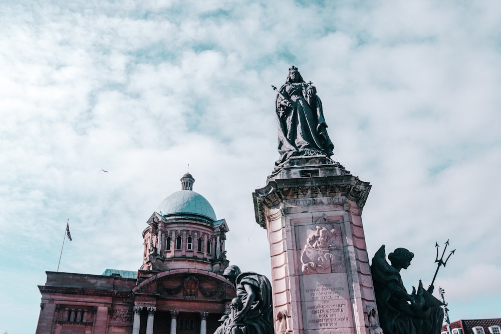 a statue on top of a building