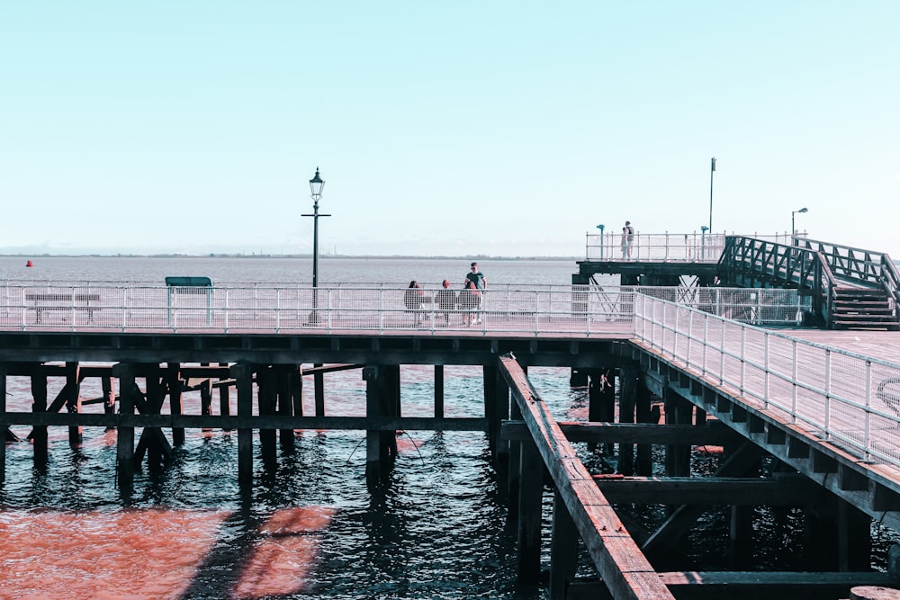 a bridge with people walking on it