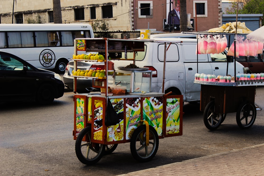 a small cart with fruit on it