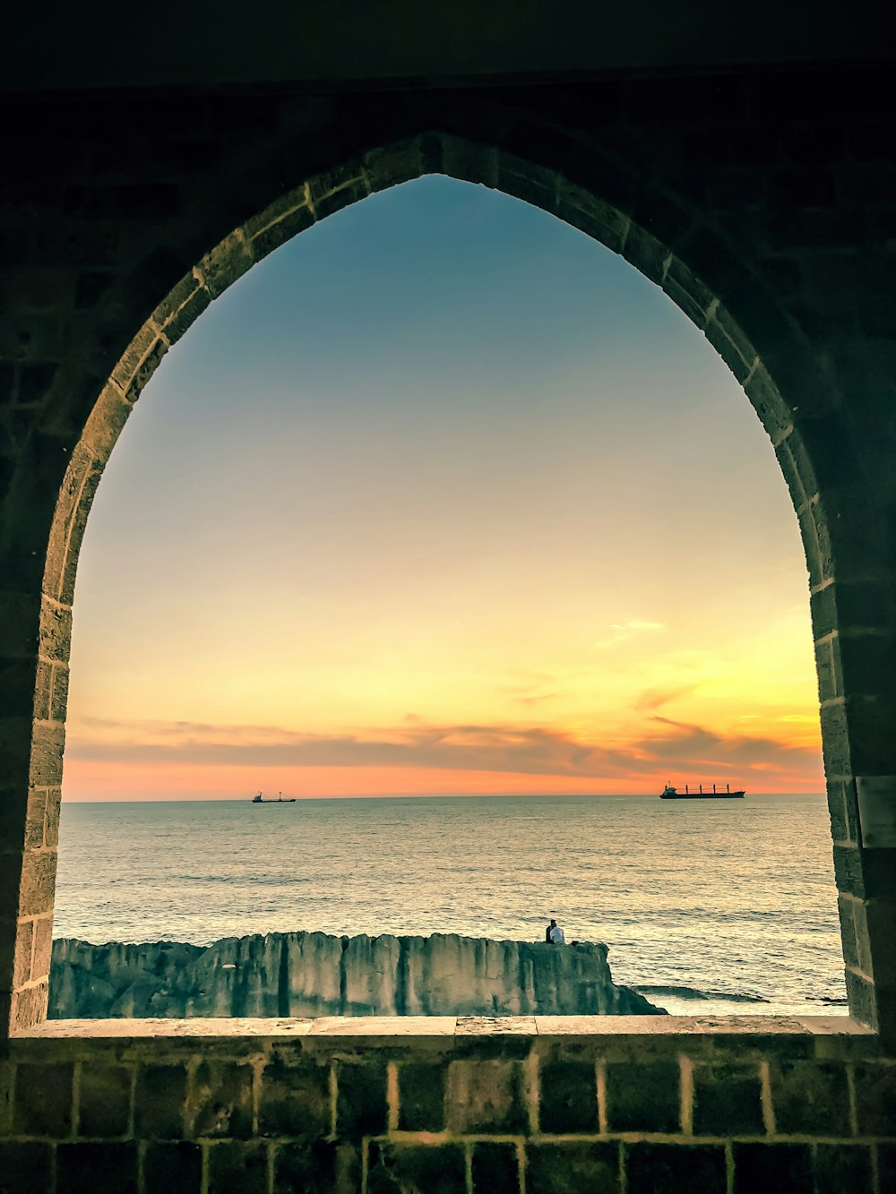 a view of the ocean from a window