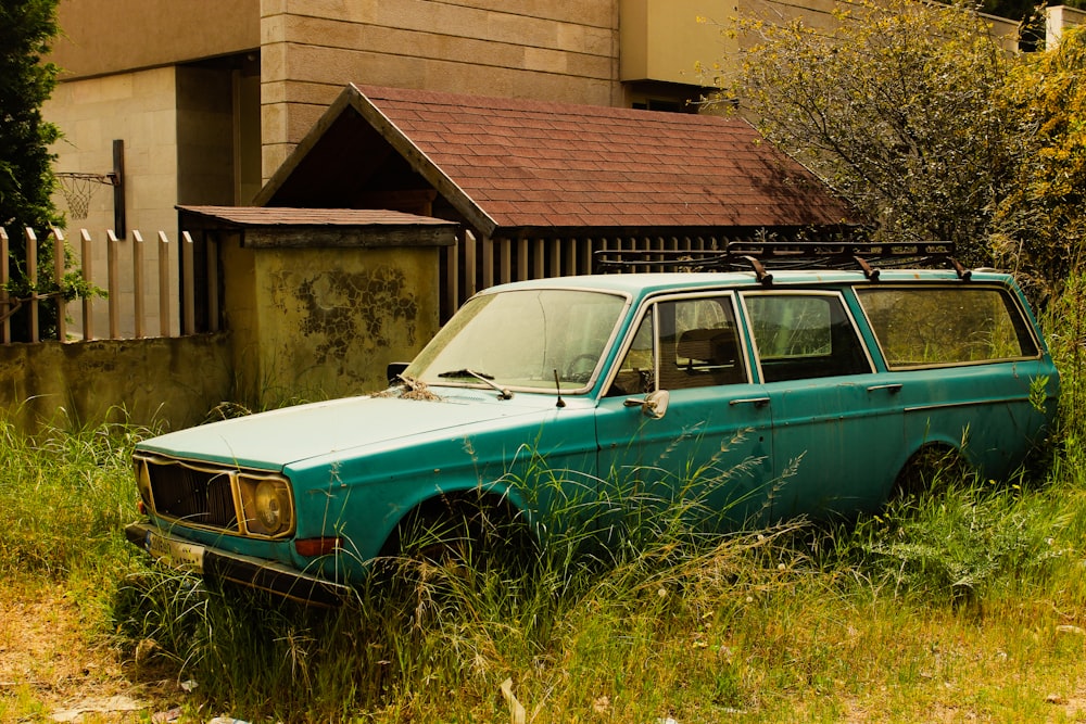 a car parked in a grassy area