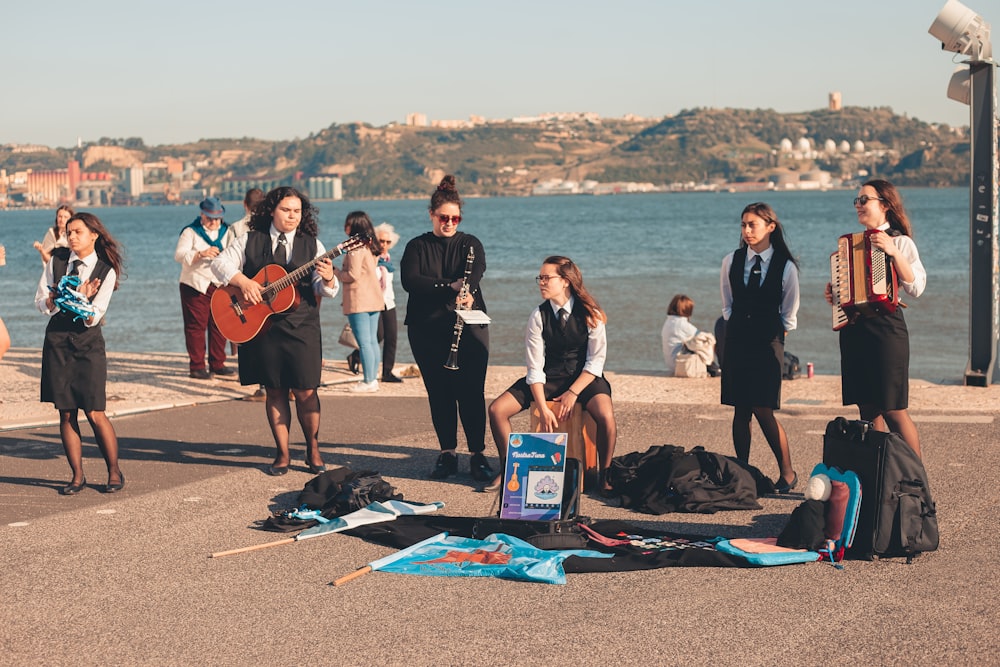 a group of people on a beach