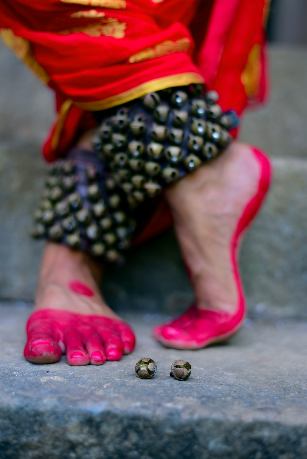 a child's feet with coins