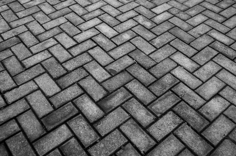 a cobblestone road with a pattern of stones