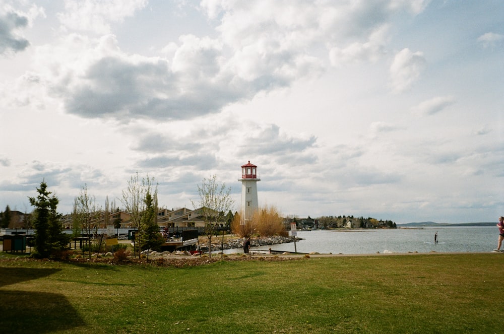 a lighthouse by the water