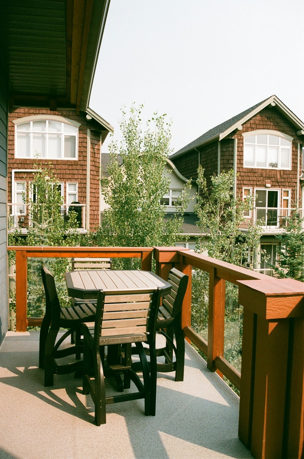 a table and chairs on a deck