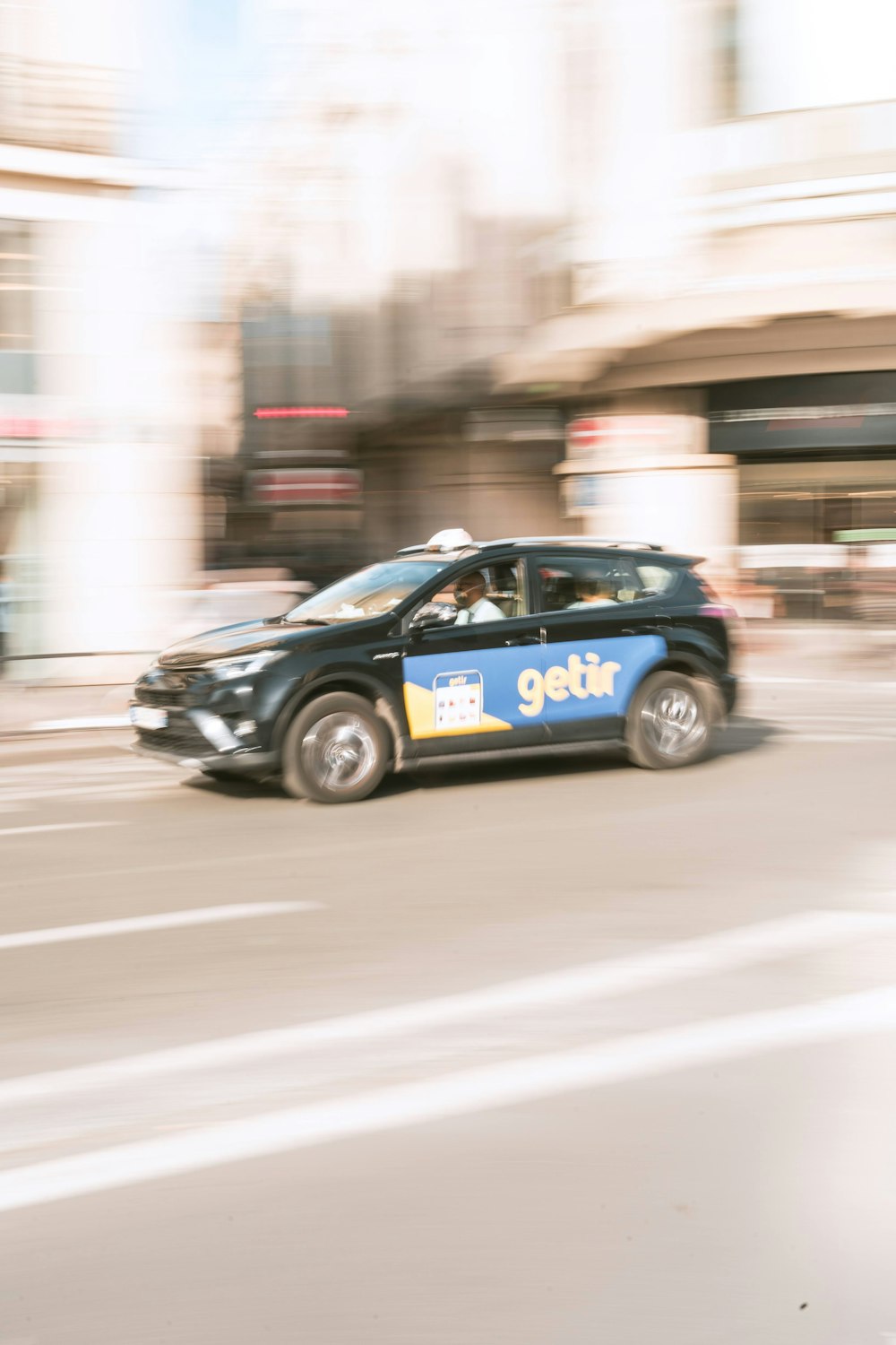 a police car driving down the street