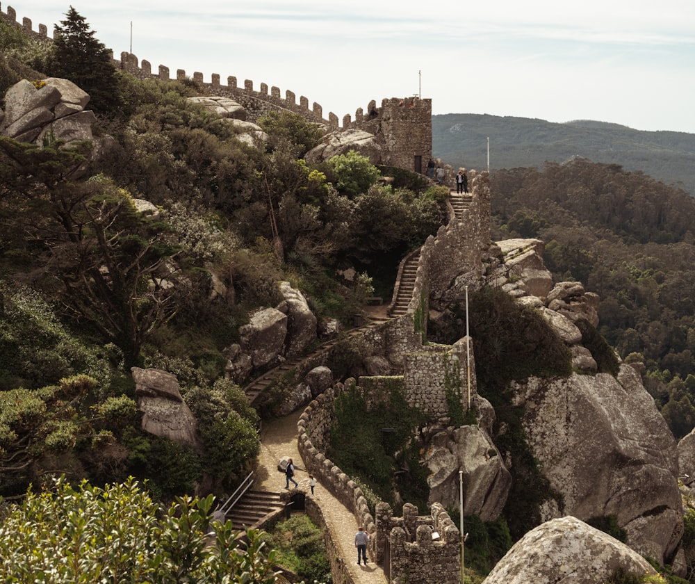 a stone castle on a hill