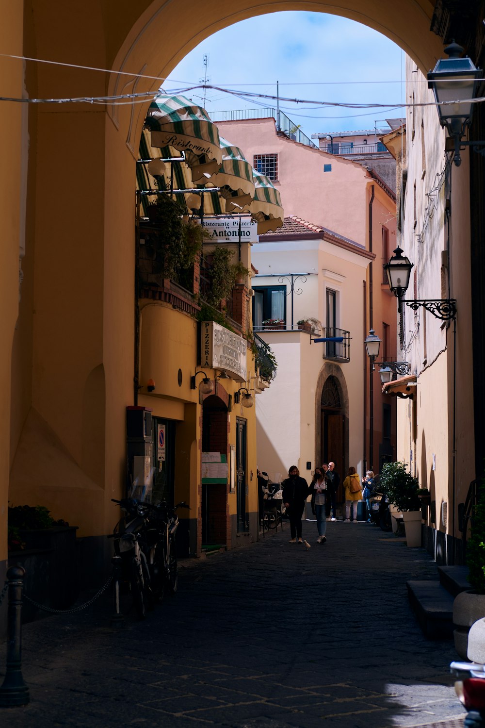 people walking down a street