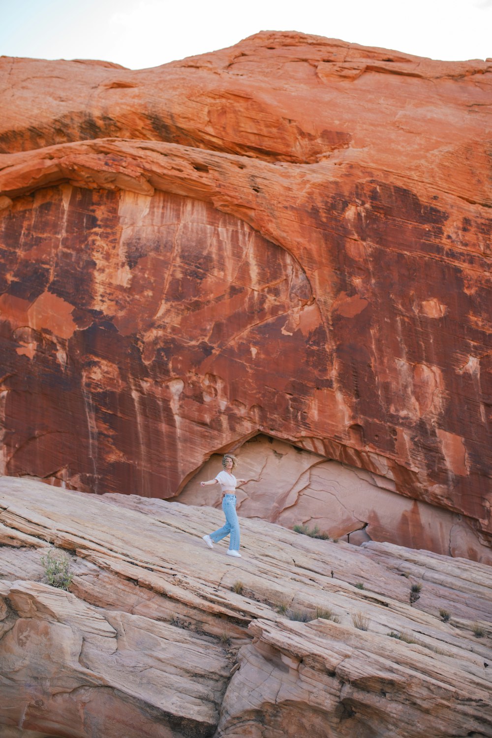 a person standing on a rock