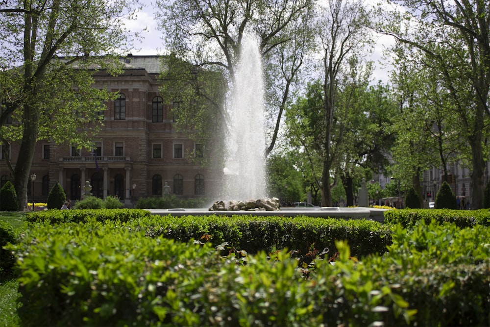 a fountain in front of a building